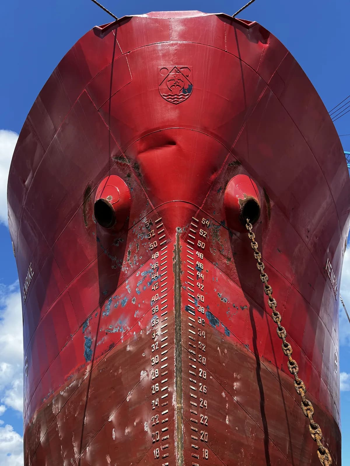Commercial vessel hull exposed for technical inspection during a shipyard period
